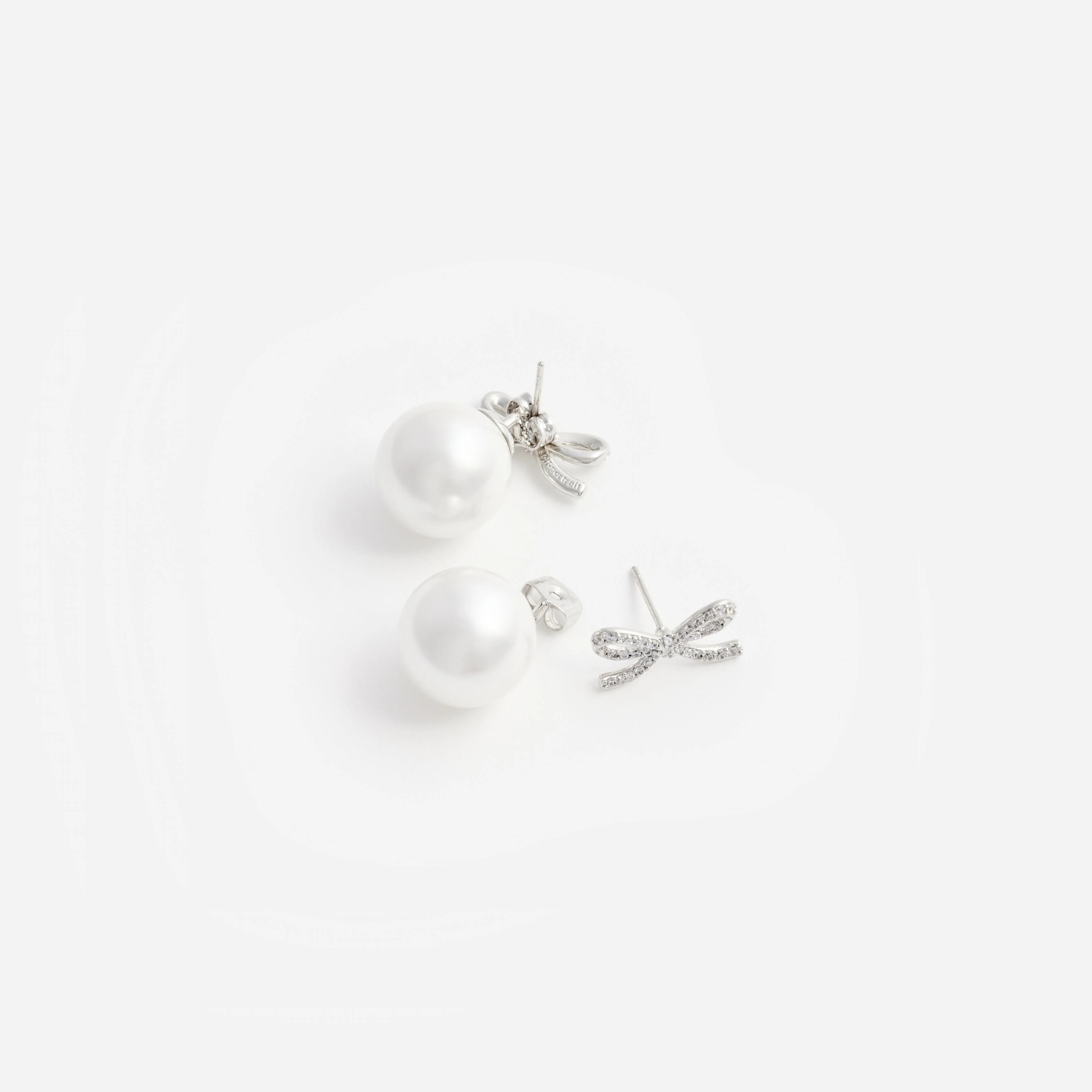 Crystal Bow Pearl Back Earrings - Image 2